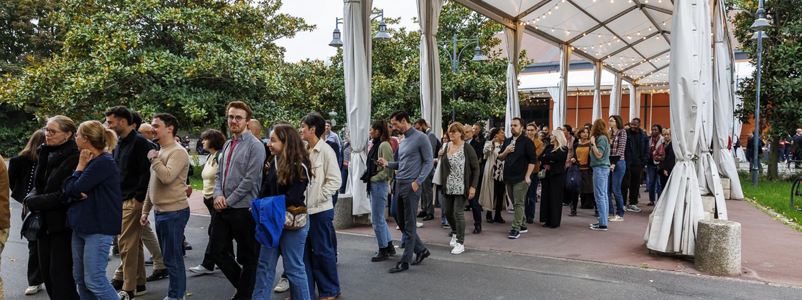 Guests arriving under the entrance marquee
