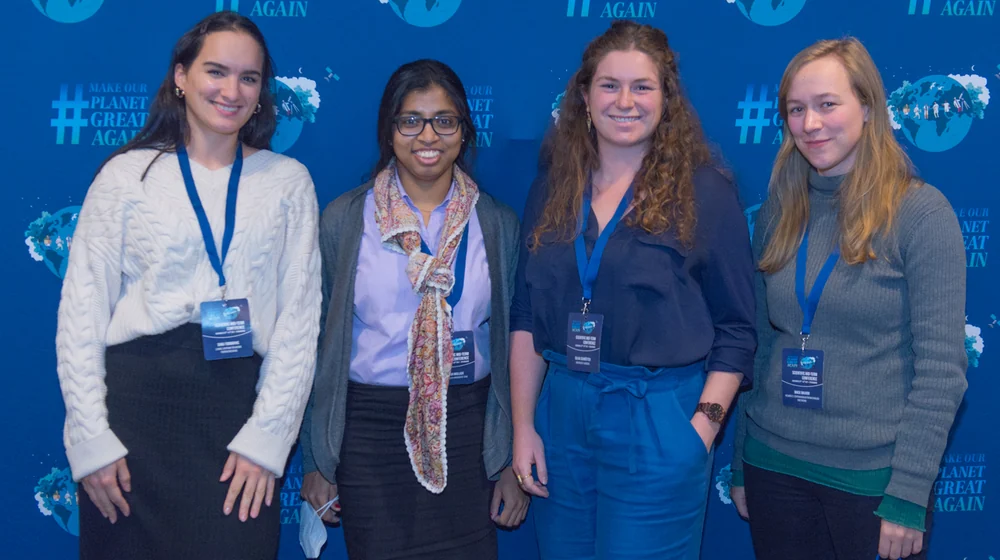 Four laureates in front of the conference photocall