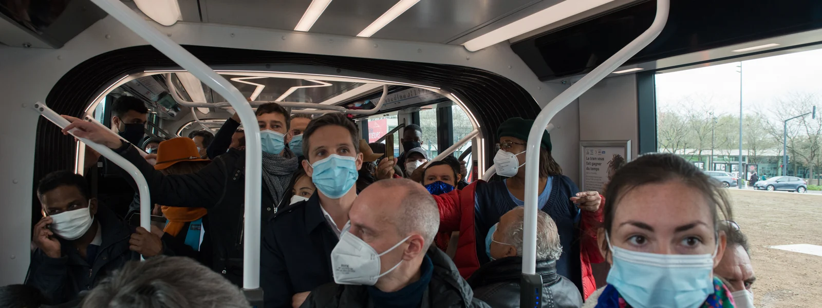 Inside a full tram during the first journey